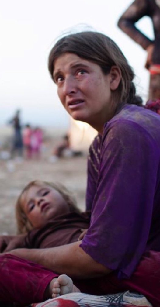AzatAlsalim's tweet image. Yezidi mother with her child trying to survive the Genocide by lSlS Terrorists.

No campus protests for Yezidis!