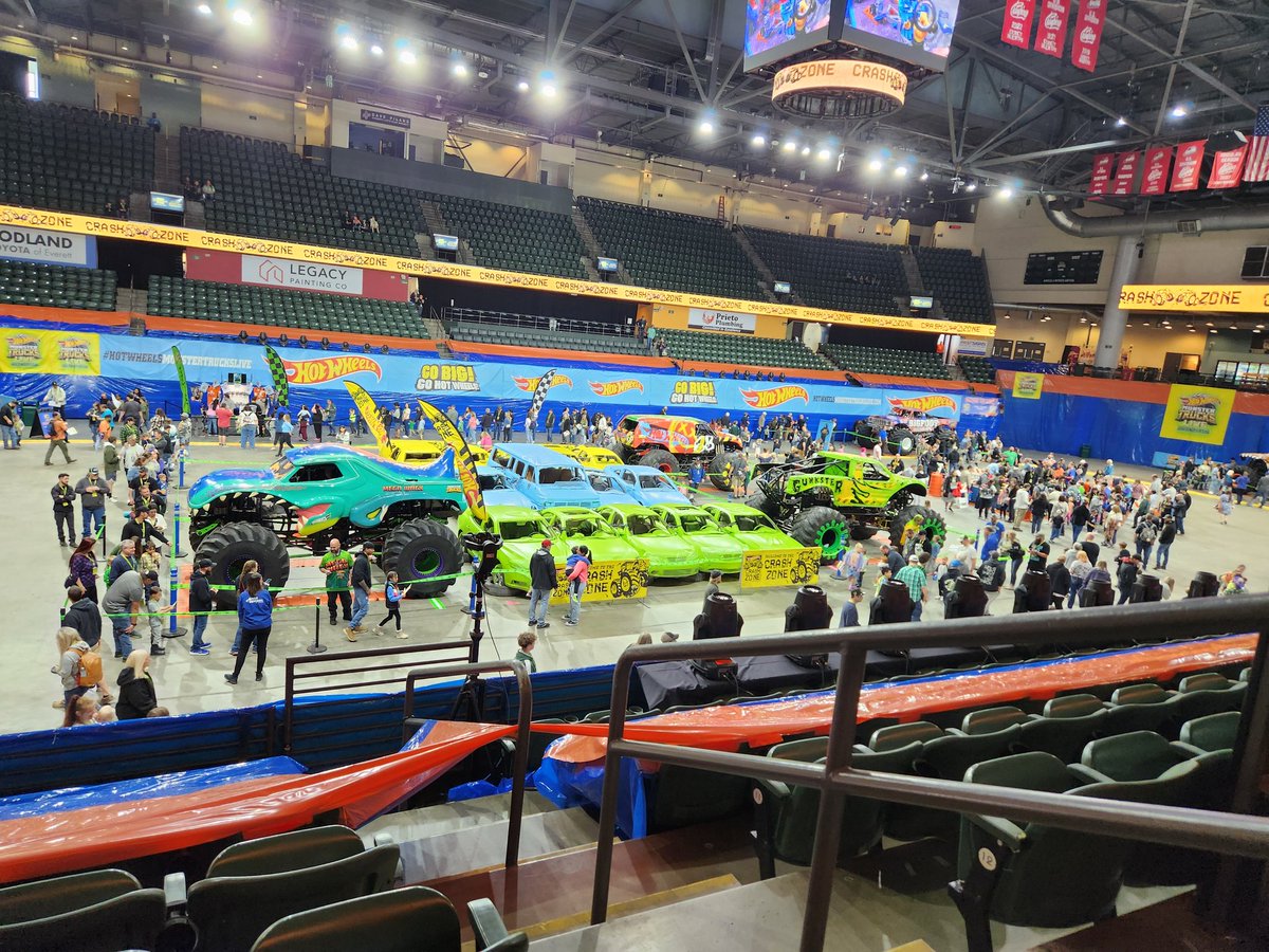 Mystorieman's tweet photo. Father and son day! So excited to see all of our favorite monster trucks! #HotWheelsMonsterTruckLive https://t.co/0LnYecSV01