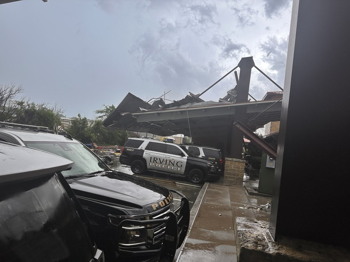 IrvingPD's tweet photo. Storm Update: 

This afternoon’s round of storms has done some damage to our North Police Station. 

Thankfully, no one was injured, and our officers are back on the streets, ready to assist the community. (1/2) https://t.co/AkkiT4mknF