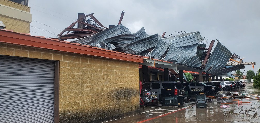 IrvingPD's tweet photo. Storm Update: 

This afternoon’s round of storms has done some damage to our North Police Station. 

Thankfully, no one was injured, and our officers are back on the streets, ready to assist the community. (1/2) https://t.co/AkkiT4mknF