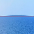 Nice of Paul to post a photo with a visible curve to the horizon. Here, look what happens when you squeeze it to 10% width.