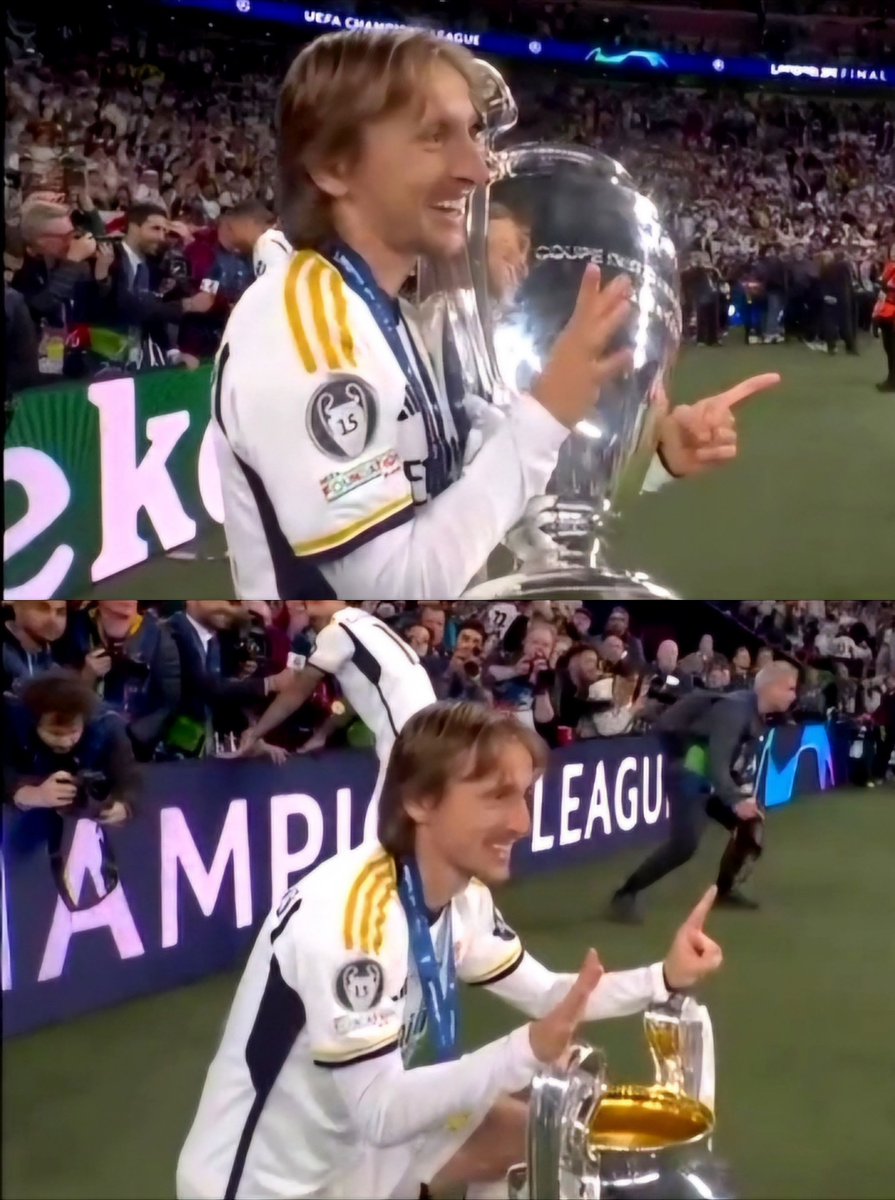 MadridXtra's tweet photo. Luka Modrić doesn't know how to pose with the trophy and show the number 6 at the same time. 😂🤍 https://t.co/HXDRtaUKq0