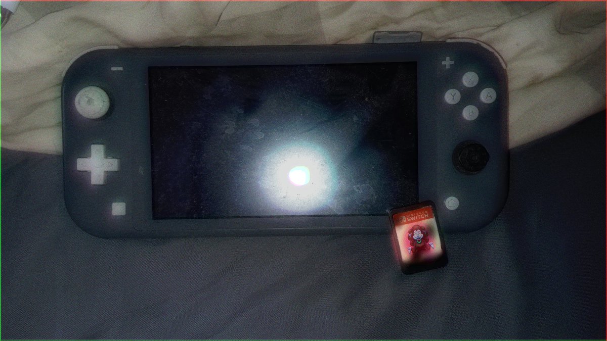 JahsierJ's tweet photo. Someone told me that they found their old switch lite, with a game he doesn't remember buying nor playing. They sent a picture:
#creepypasta #oldphoto #lostgames https://t.co/ncvcw1LjWw