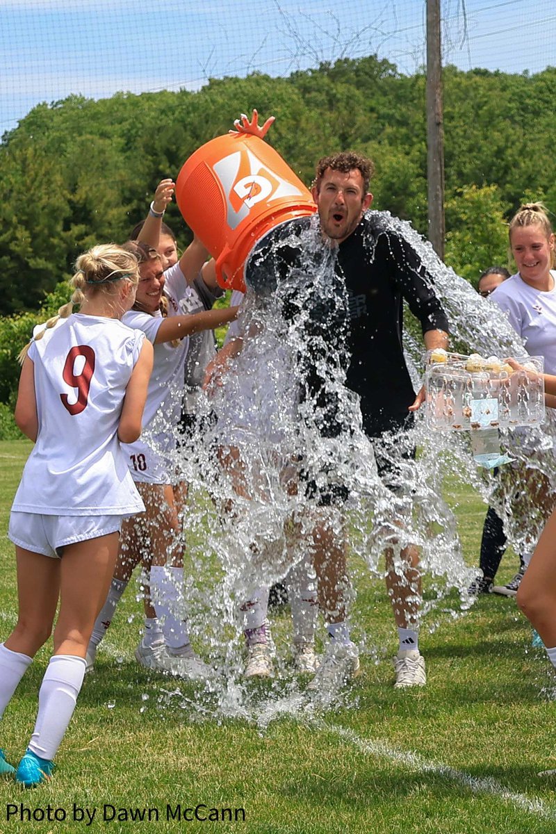 Nothing like a cold shower for Dexter girls' soccer coach Rhys Moller to celebrate the Dreads D2 district title