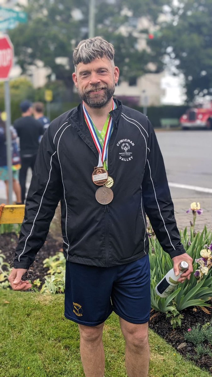OakBayPolice's tweet photo. Chief Julie Chanin led the Oak Bay Tea Party Parade today. Thx Chris for riding along. Chris is a Vancouver Island Special Olympian who medaled in skiing & soccer. Thank you to our OBPD members and volunteers for a safe and successful parade. #SOBC #LETR #specialolympicsbc https://t.co/eQeHZJGrN2