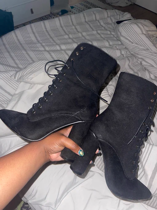 My  You want these little wicked witch shoes? What? Yea, Wicked witch of the East? You know when the house fell on her? Yall, Why she hold these up??  