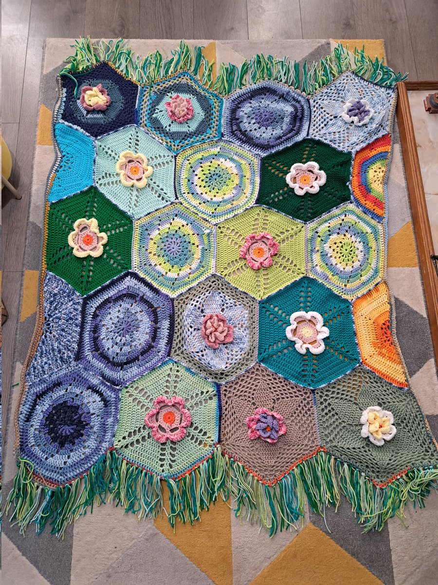 I have made the #aquablossoms @thecrochetcrowd blanket. It will be donated to an event to raise money for <a href="/NWAirAmbulance/">North West Air Ambulance Charity</a> in memory of my brother in law. #crochet