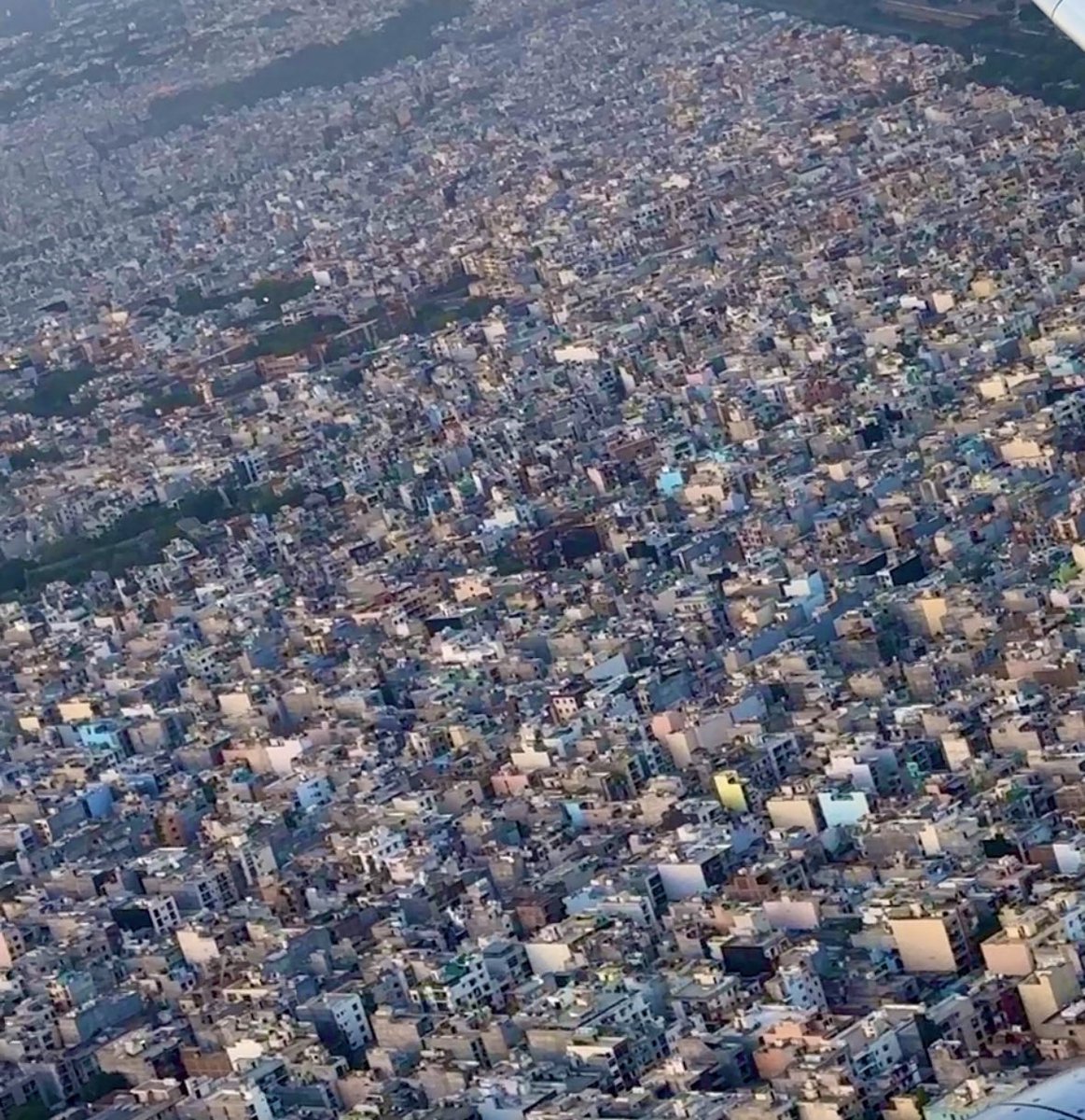 ramveertanwarg's tweet photo. This week the maximum temperature in Delhi reached 52 degrees. There could be many reasons for this, but one that I think is the scarcity of trees and natural water bodies in some areas of Delhi. In many buildings, there are multiple air conditioners, but not a single tree is visible. I took this picture yesterday from a flight during takeoff from New Delhi airport.

@moefcc @ndmaindia @DPCC_pollution