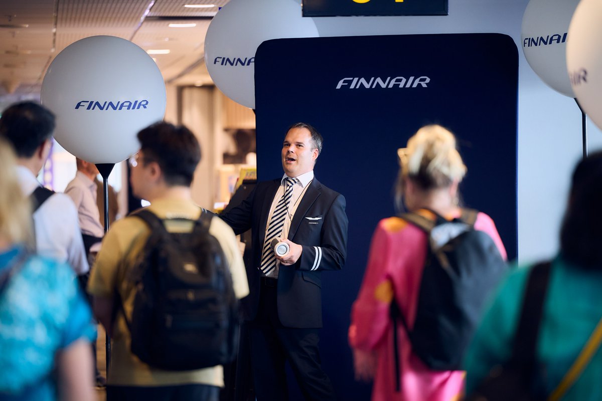 Finnair's tweet photo. It’s been 100 years since our first flight to Stockholm, Sweden. To celebrate this beautiful milestone, Finnair Singers and our flying pilot Mikael Konttinen delighted our customers by performing at Helsinki Airport and Stockholm Arlanda, and on selected flights yesterday. https://t.co/EmpcWvP25H