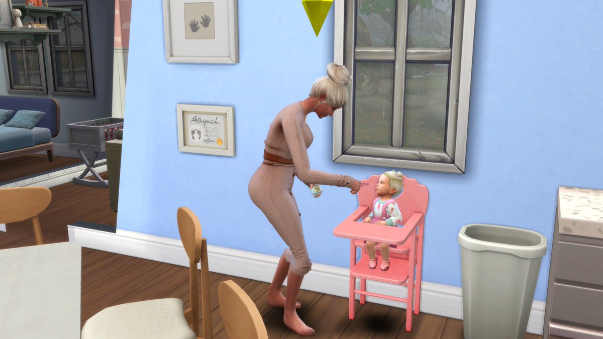 SJaysims's tweet photo. Baby Felicity trying food for the first time! Also Aubrey teaching Felicity to try standing! 
#sims4legacyfamily #legacyfamily #growingtogether #sims4growingtogether #sims4 https://t.co/8T05Ly5G0D