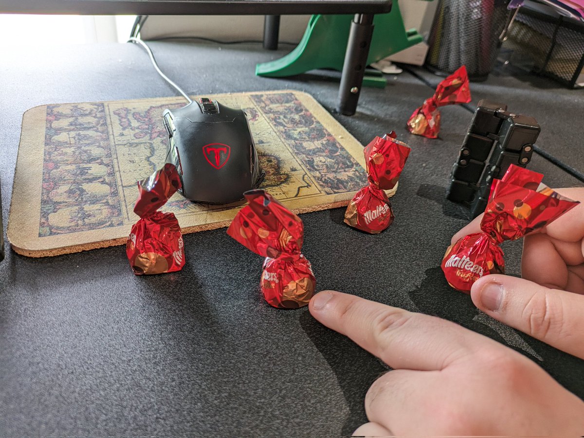 CodingDino's tweet image. The indie life - using maltesers to illustrate game features. #indiedev #gamedev