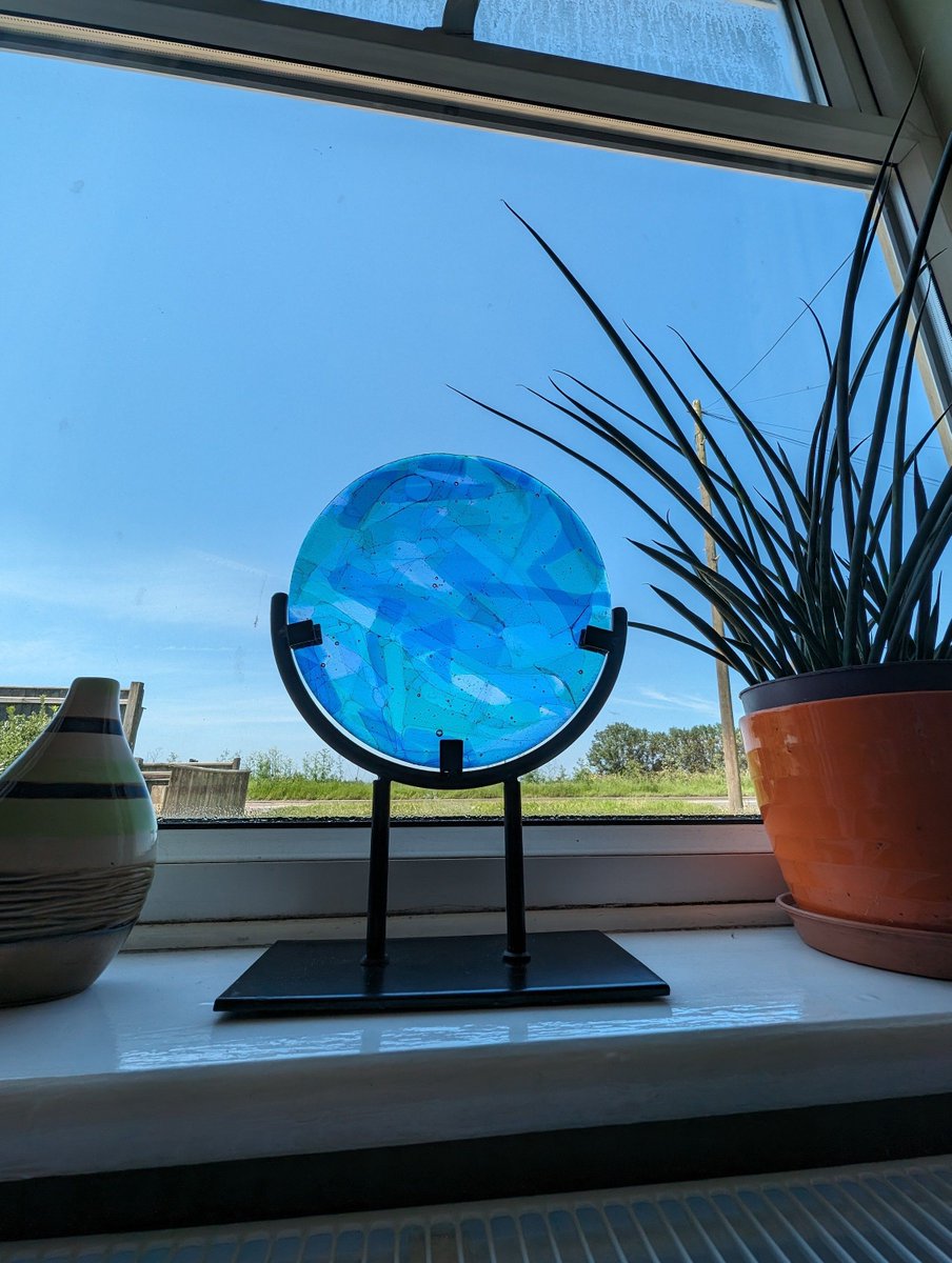 Something new and different. I just finished this stunning fused glass freestanding suncatcher. Amazing colours within this unique handcrafted home decor piece. Amazing colours of blue and green. #handmade #giftideas #shopindie #etsy buff.ly/3R7XCHK