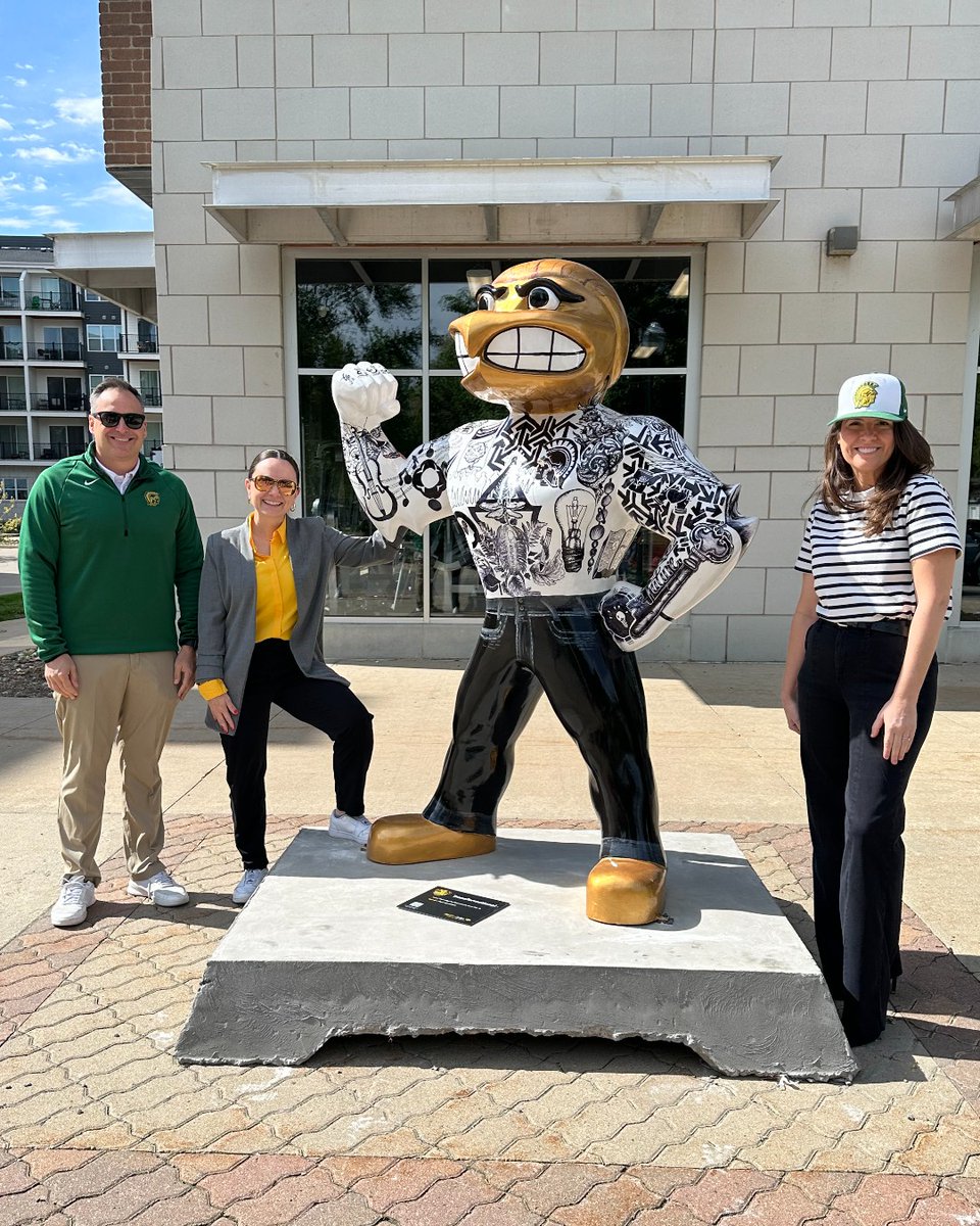 HerkyOnParade's tweet photo. "Transformational" is covered in images and ideas that represent how education can transform you. This #HerkyOnParade statue was created by students in the West High School art department and is sponsored by @IowaCityWestHS. https://t.co/s7SpOKYUNE