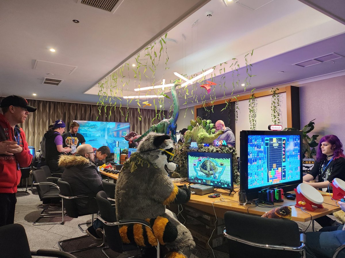 CyrusBearHound's tweet photo. Thinking about how much of a good time I had at @Scotiacon_Info this year with the Barkade. Had a lot of fun with the dino theme and giving everyone a chilled place to come play some games. Hope to do this for many more years to come ❤️ https://t.co/68jhDx6Fgc