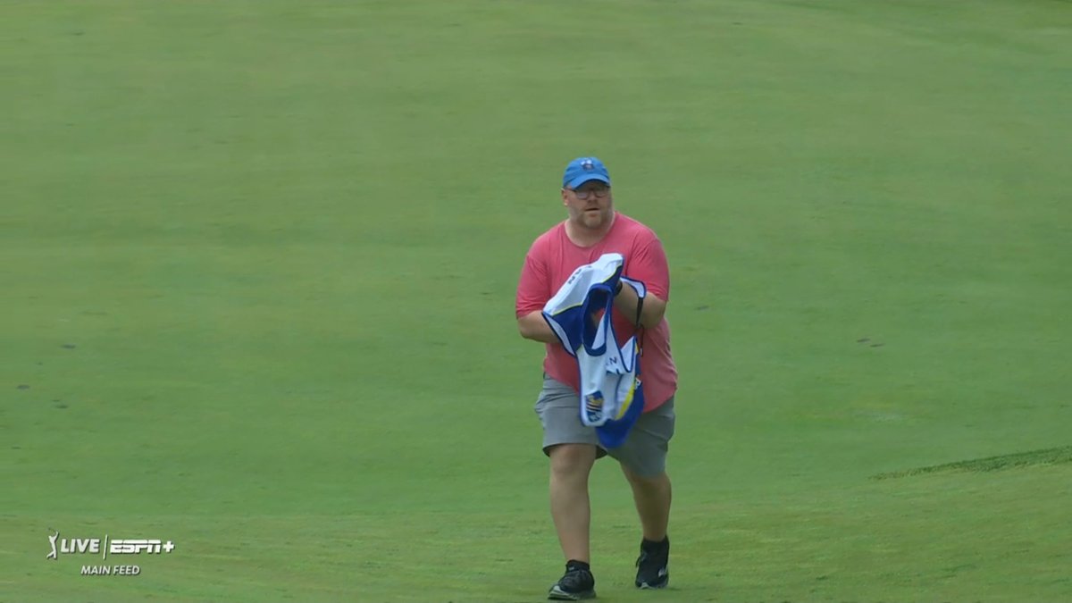 pmcdonaldCBS's tweet photo. Fluff took a spill on the third hole and is unable to continue caddying, so C.T. Pan called a fan out of the bullpen to carry the sticks the rest of the day. Absolutely incredible. https://t.co/QNSGJOFEJi