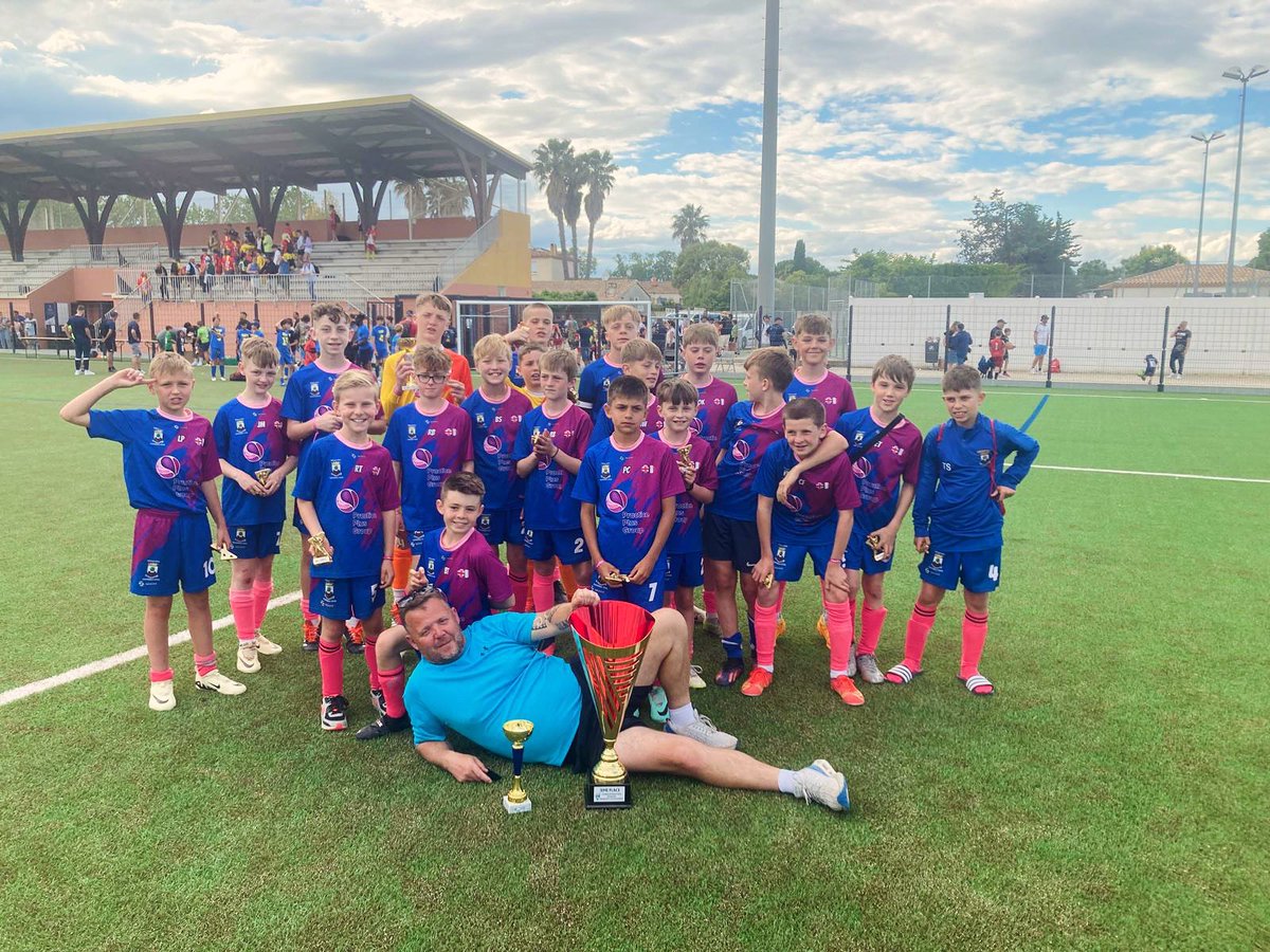 CityWellsfc's tweet photo. What a week 🏆 … Well done team and thank you to everyone 🇫🇷

Back to school now lads 📚✏️

Oh and what a trophy 🏆🍾🏆 https://t.co/tiX5X0QetV
