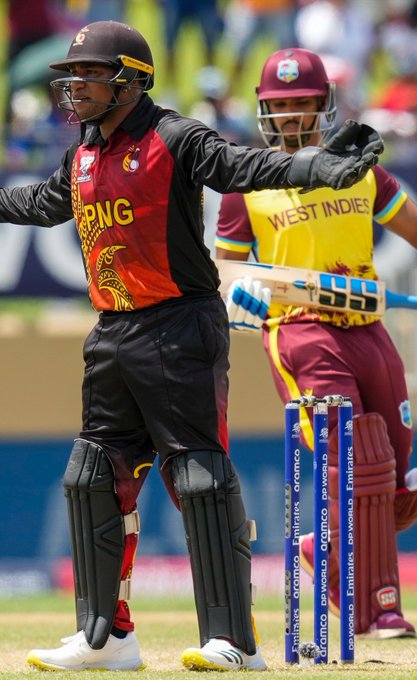  Big wicket for PNG, Nicholas Pooran departs after scoring a run-a-ball 27.
