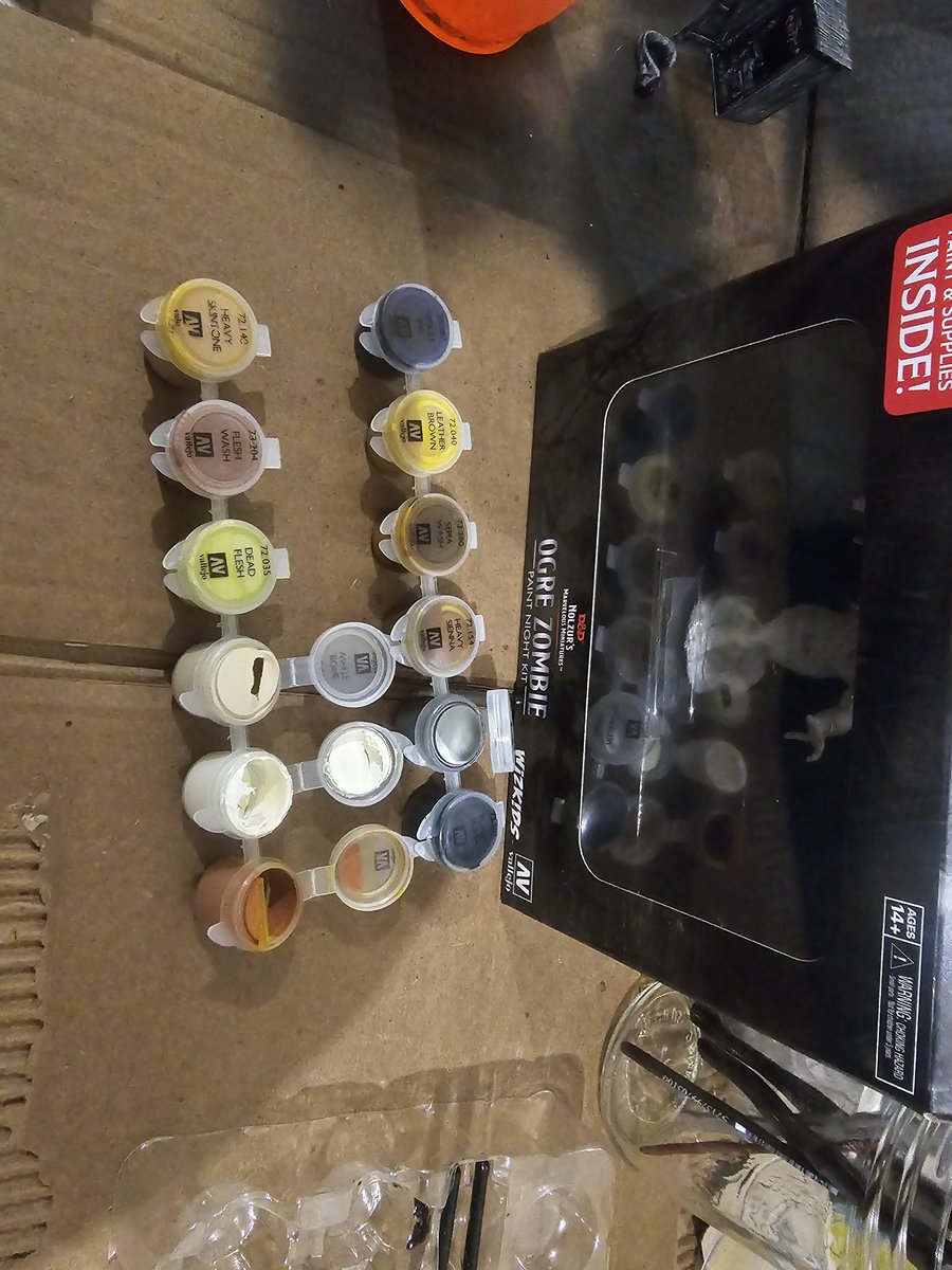 GoreFlow's tweet photo. @wizkidsgames  Hey, so I got a kit to tackle this ogre zombie. Noticed several paints dried .My first paint night kit, but certainly they shouldn't be like that, right? https://t.co/j2o81rAu2l