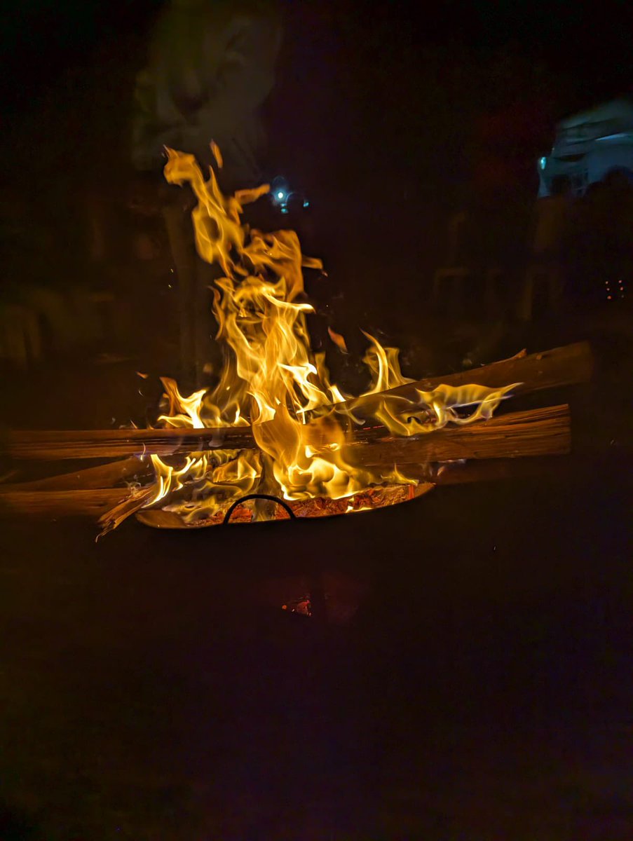 TimKipchumba's tweet photo. Our #mentorthon team can’t agree which photo won the content.  

1. Carrying a glass of water with 3 Strings 
2. Fireplace 
3. Bird listening to the mentors telling stories 
4. Drone photo of Students planting trees all at once. 

Poll below https://t.co/nlvfZqFe36