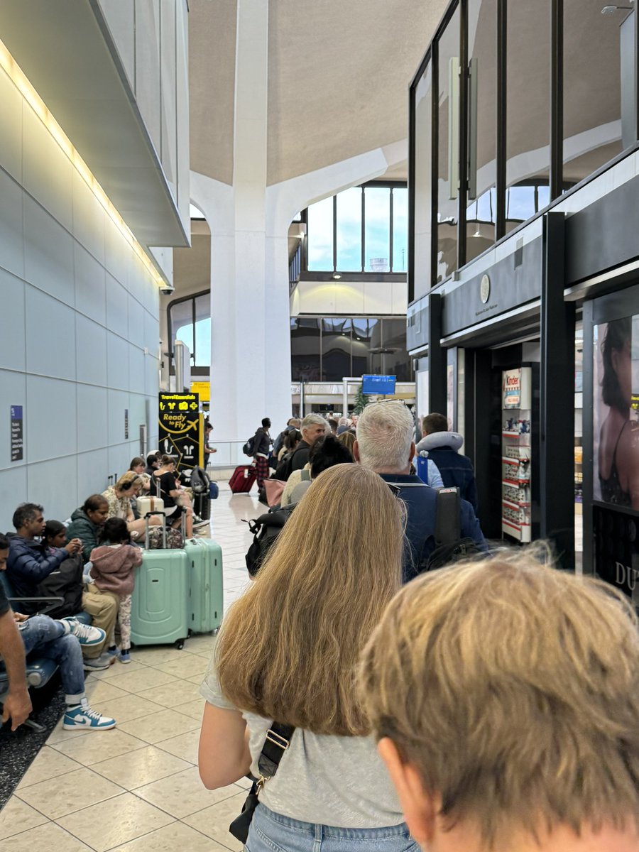 LazyProtester's tweet photo. @TSA are you guys kidding?   No pre check line (clearly money well spent) and I can't even see the security area from end of line @EWRairport, @flysas 

This is an absolute joke https://t.co/zcZH3KXarA