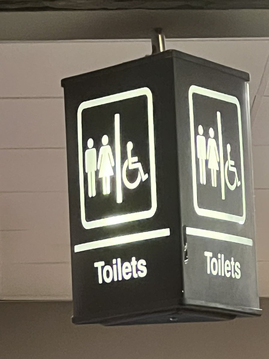 Why do the toilet signs at Cork airport look like they belong in the opening credits of The Office?