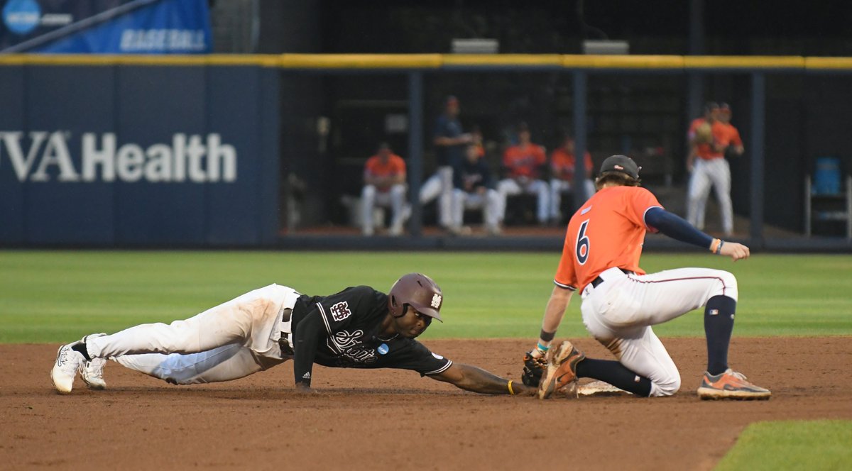 UVa shortstop Griff O'Ferrall (6) tags out MSU's Jordan Dakota as he overslides second base. (Cal Tobias/@DailyProgress)