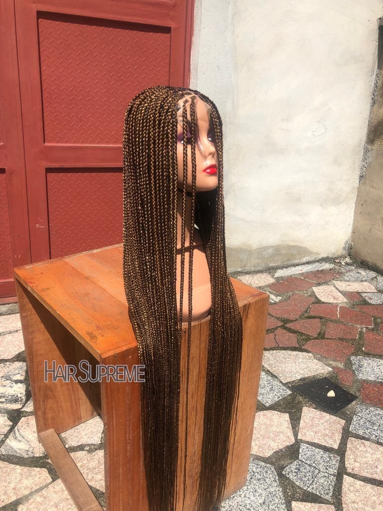 4×4 closure braided wig for just 23,000 naira.