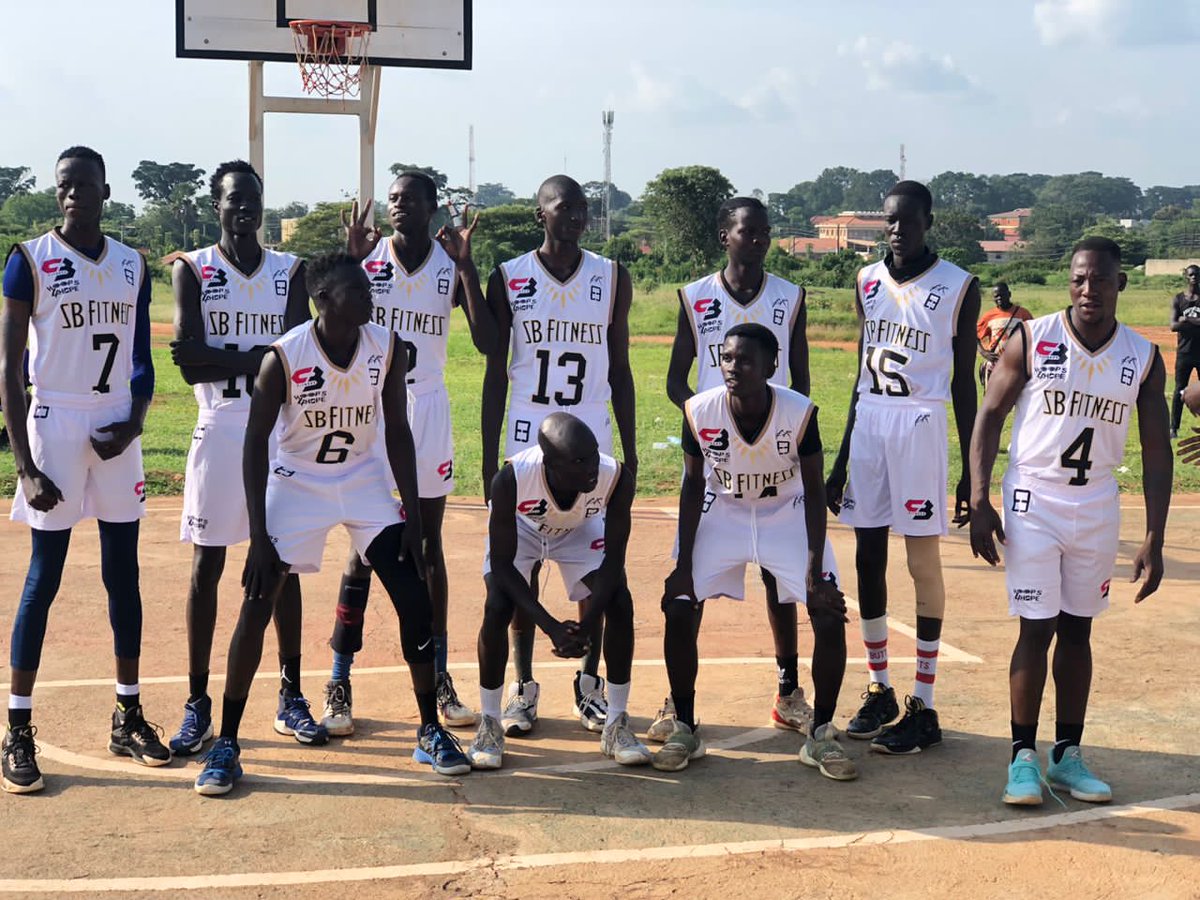 The game of basketball. Vet team Vs the Jr team.. 
Acholi Basketball League.
