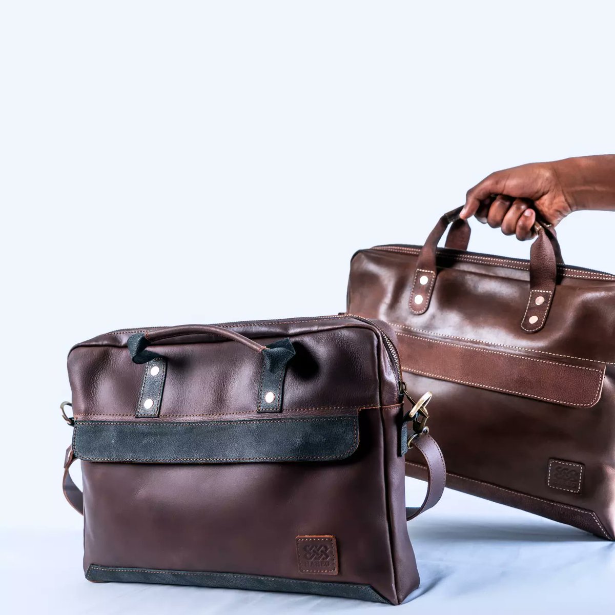 HaregDesigns's tweet photo. Carry your world in style with our new Manbuk laptop bag, where fashion meets function. Comes in two sizes and color varieties.#madeinethiopia #ethicalfashion #leathercrafts #handmade https://t.co/EdXgvjkVlS