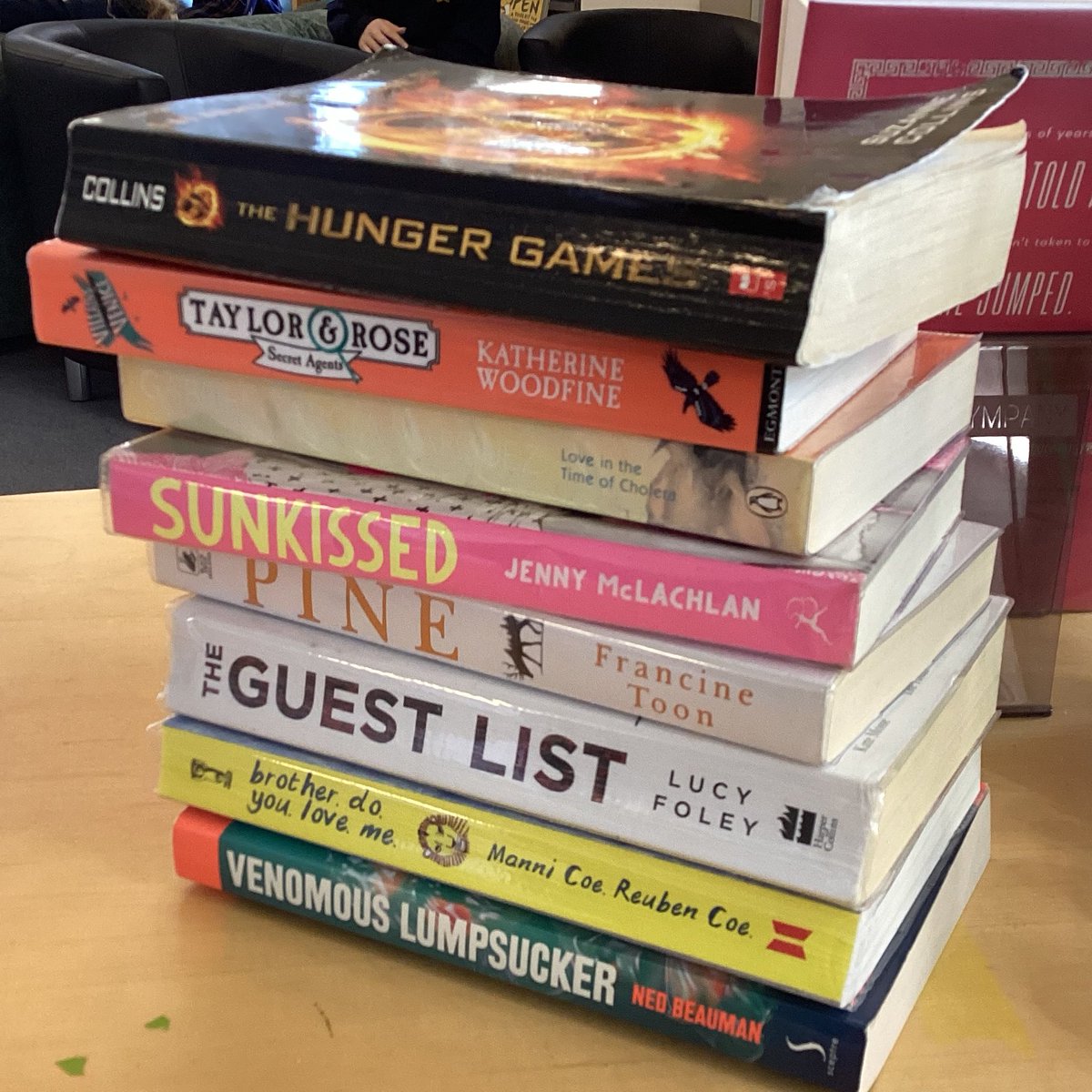 CollegiateLibs's tweet photo. A small pile of book returns in the first half hour of being open, but these 8 came from 2 staff members, a Year 7, 8, 10 and Year 12 students and each generated a lovely conversation  - the perfect start to the first Monday back after half term! #GreatSchoolLibraries https://t.co/crtGnt5HSt