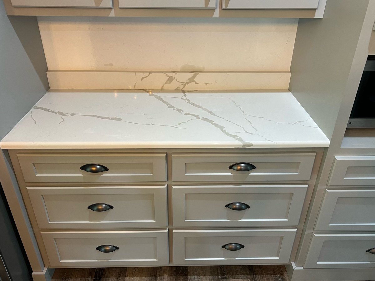 AndCabinet's tweet photo. Check out these tops we put in for one of our builders yesterday. You just can’t beat Calcutta Laza quartz . That island is such a cool color.

Countertop &amp; Cabinet 
6210 CR 222 
Cullman Al
2567354490

#cullman
#smithlake
#countertops
#quartz
#granite
#lakelife
#kitchen
#marble https://t.co/o02xL3cc7Y