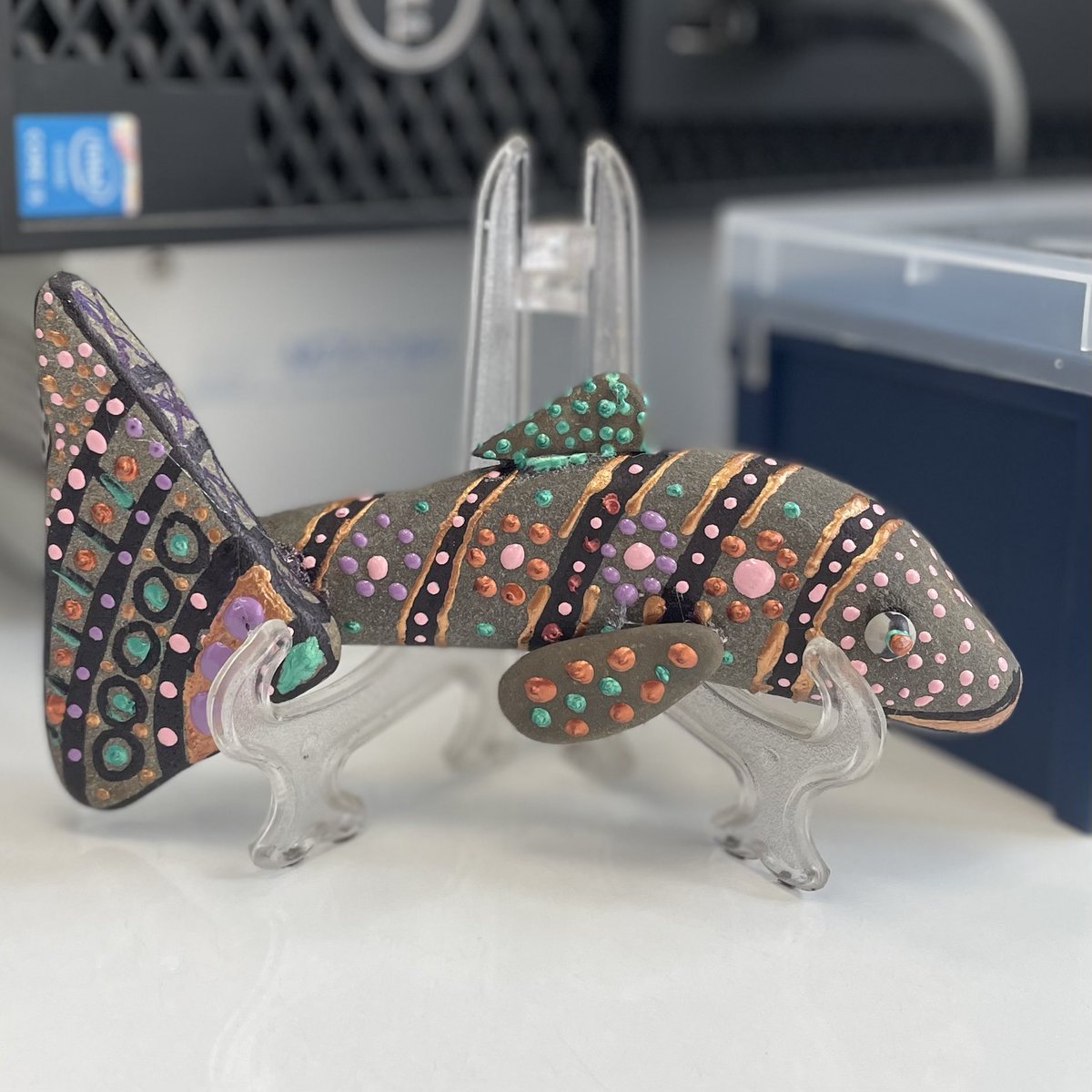 Fishing on Lake Baikal.
🎣
My colleague Olga created and gave me this fish from stones found on the shore of Lake Baikal.