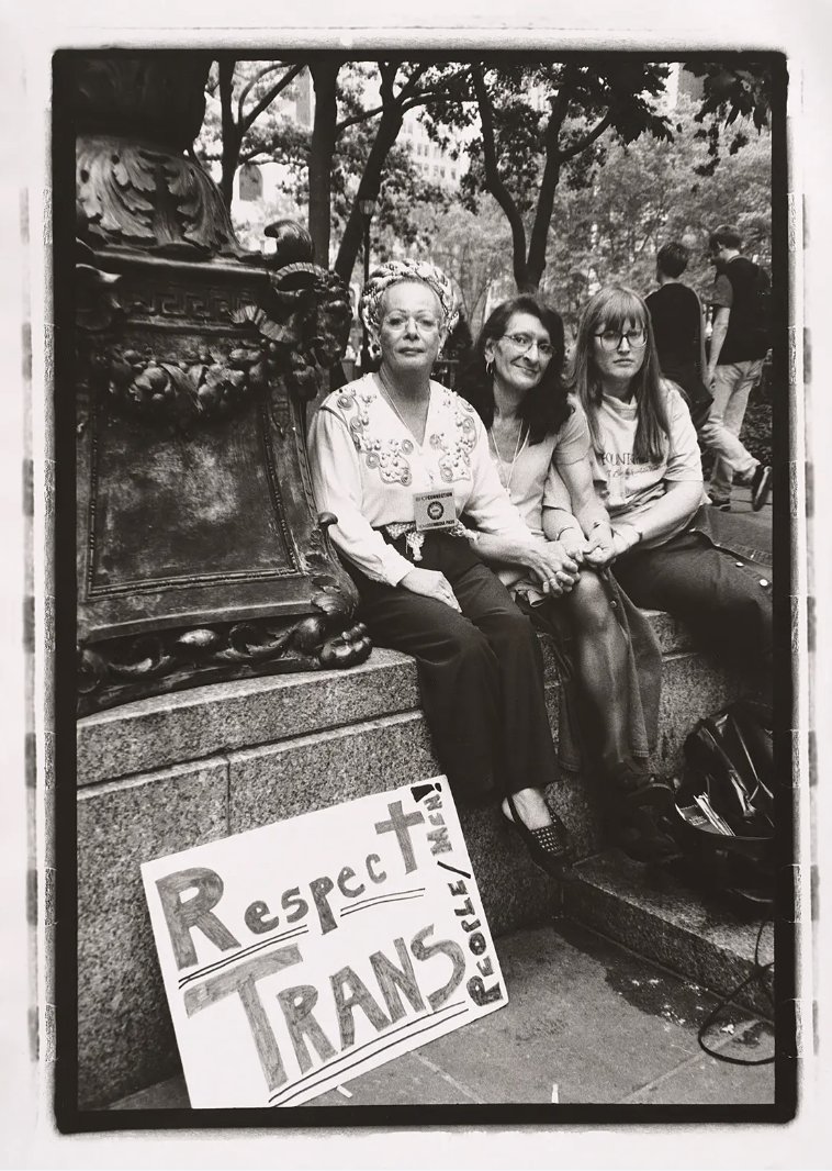 We mark the start of Pride Month with the work of artist-photographer Luis Carle. His photograph “Respect Trans” includes Sylvia Rivera with her partner Julia Murray and friend Christina Hayworth at a rally in Bryant Park in June 2000.