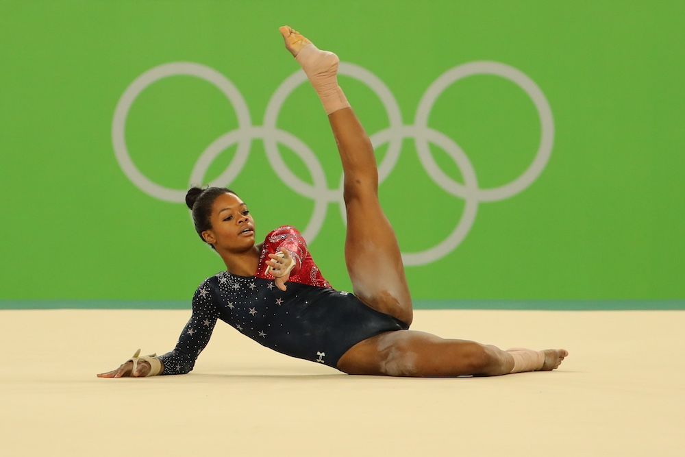 glittermagazine's tweet photo. Gabby Douglas Withdraws From Championship After Remarkable Comeback https://t.co/1d0LRu8LSr #GabbyDouglas #XfinityChampionships https://t.co/2qgOUG8SlY