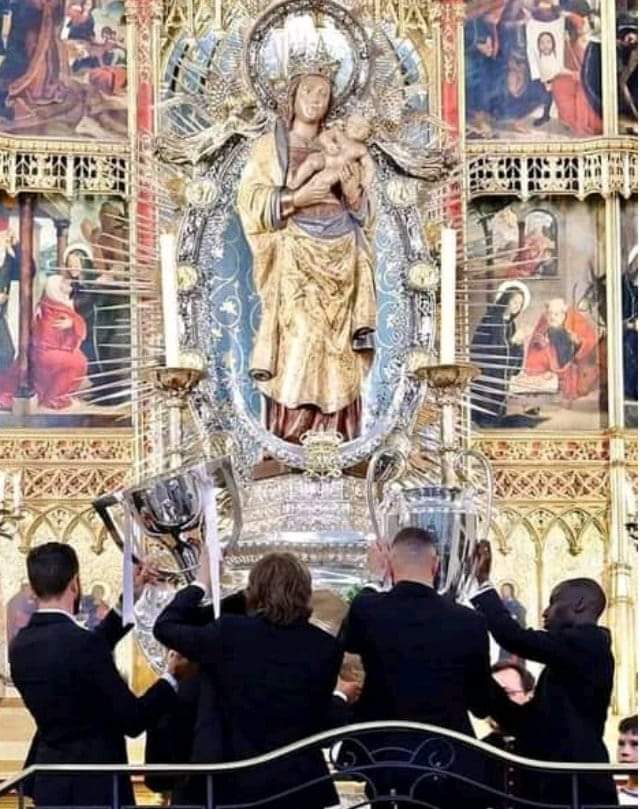 SanctaFamiliaTV's tweet photo. After winning the Champions League trophy by defeating Borussia Dortmund, the first thing Real Madrid players did was visit Almudena Cathedral in Madrid to offer their trophy to the Blessed Mother https://t.co/qtXZrGPXmS