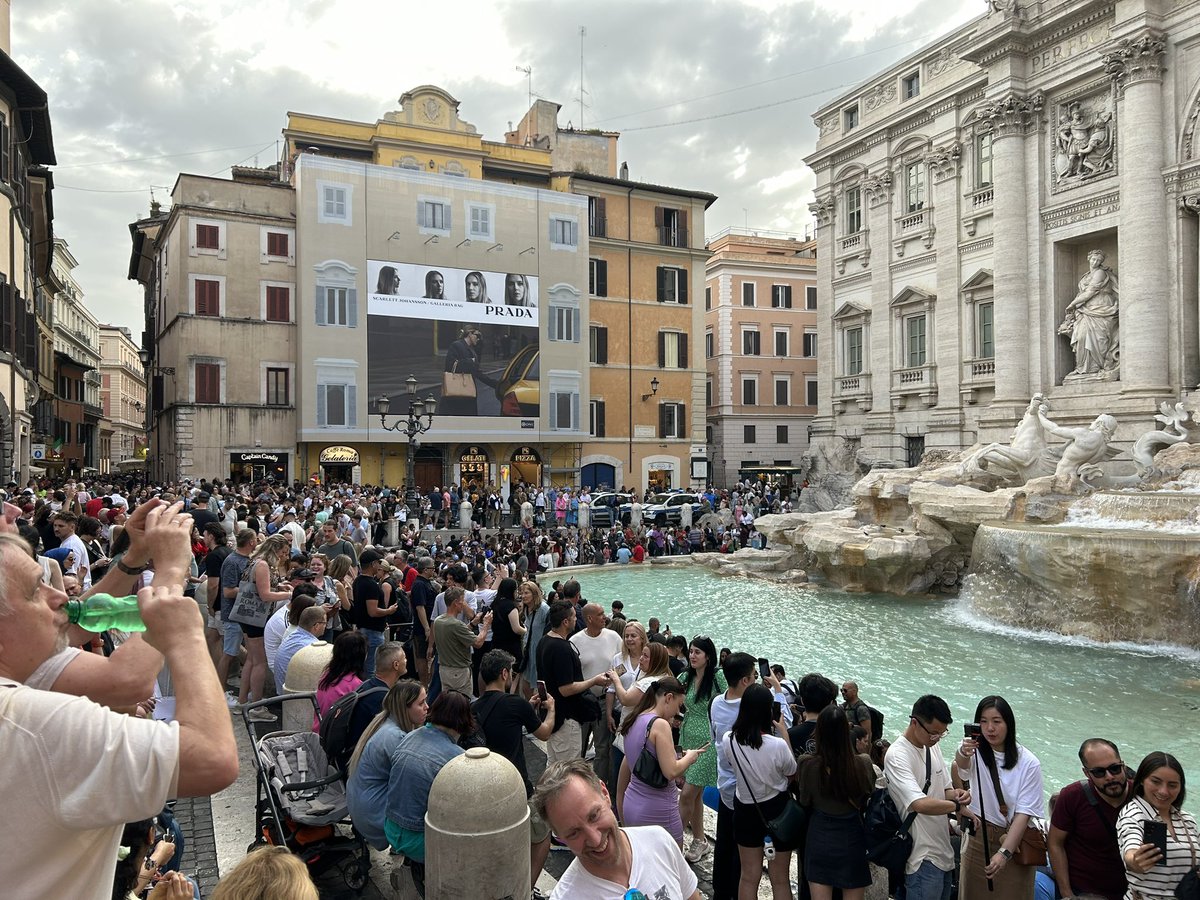 Did some traveling in Italy and everyone was sitting here looking at this fountain. And all I’m wondering is how much Prada paid to have their ad here. Gotta be a big number…