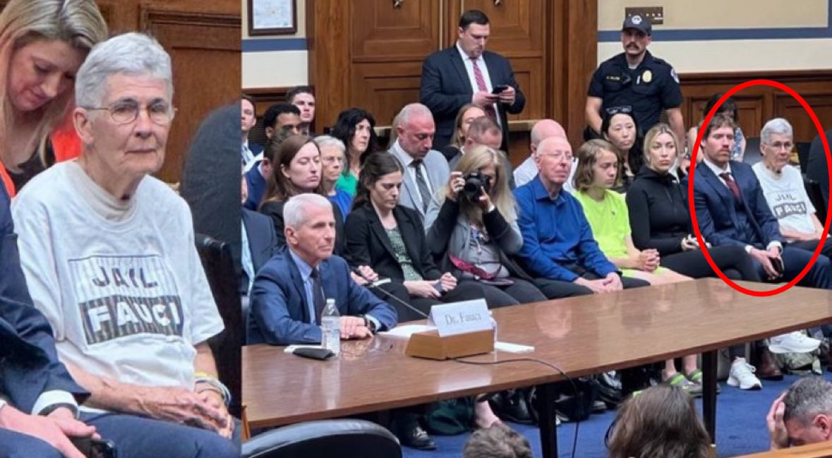 As Dr Anthony Fauci testifies before Congress today, a woman sits just meters behind him wearing a ‘JAIL FAUCI’ t-shirt.