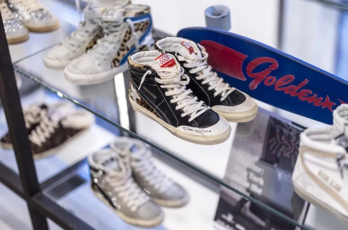 GeorgiGvakharia's tweet photo. Golden Goose, known for its $500 "vintage finish" sneakers loved by celebs like Taylor Swift, is eyeing a €3B IPO in Milan. With $637M revenue in 2023 and 21 new store openings, can they keep shining in a market where luxury experiences are the new trend?  #LuxuryMarket #LuxuryGoods