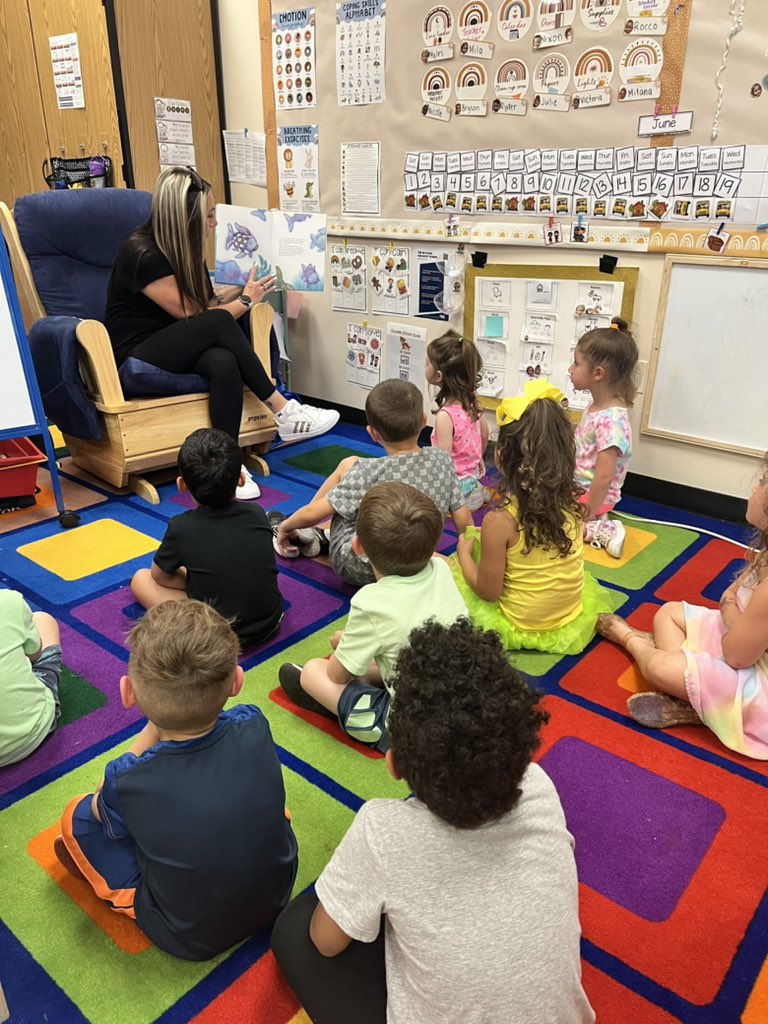 Thank you to our mystery reader, Ms. Finkel! They loved the rainbow fish and Rocco was so happy to see you ◡̈ #prek #mysteryreader #barnegatinspires 🖤🤍🧡