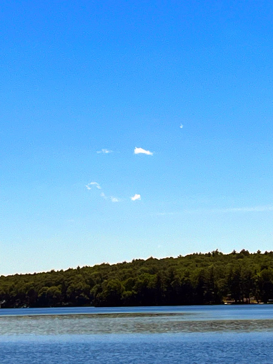 It was a gorgeous weekend on which to celebrate the commencement of the Class of 2024; nature smiled upon us—literally. Mrs. Haines shared this image on Saturday with the message: "Here are some smiley face clouds over our lake. Even the sky is smiling upon our graduates!"