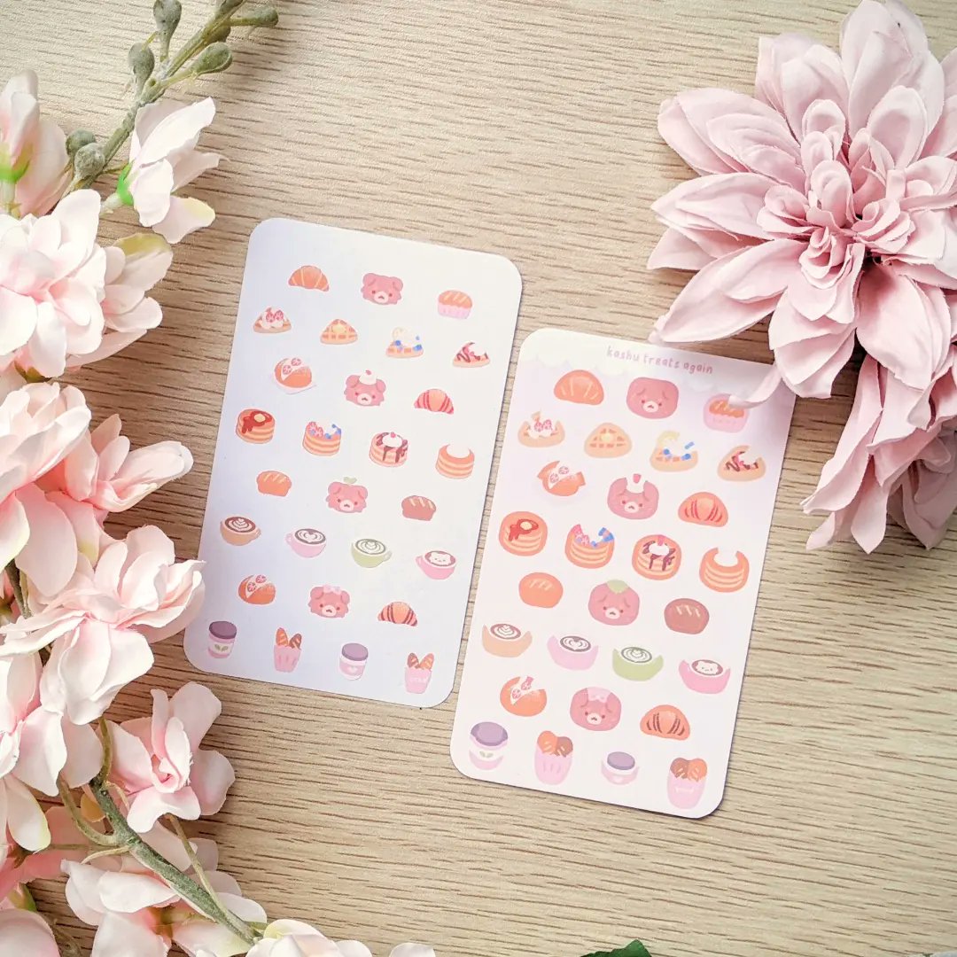 embubuu's tweet photo. Some sticker sheet prototypes I've been working on! 🍓 These are teeny tiny (3x5 inches) as I've been playing around with the sheet ratios and such! Still, it's fun drawing yummy stuff ☕🍞❤️ https://t.co/RSvApj10U8