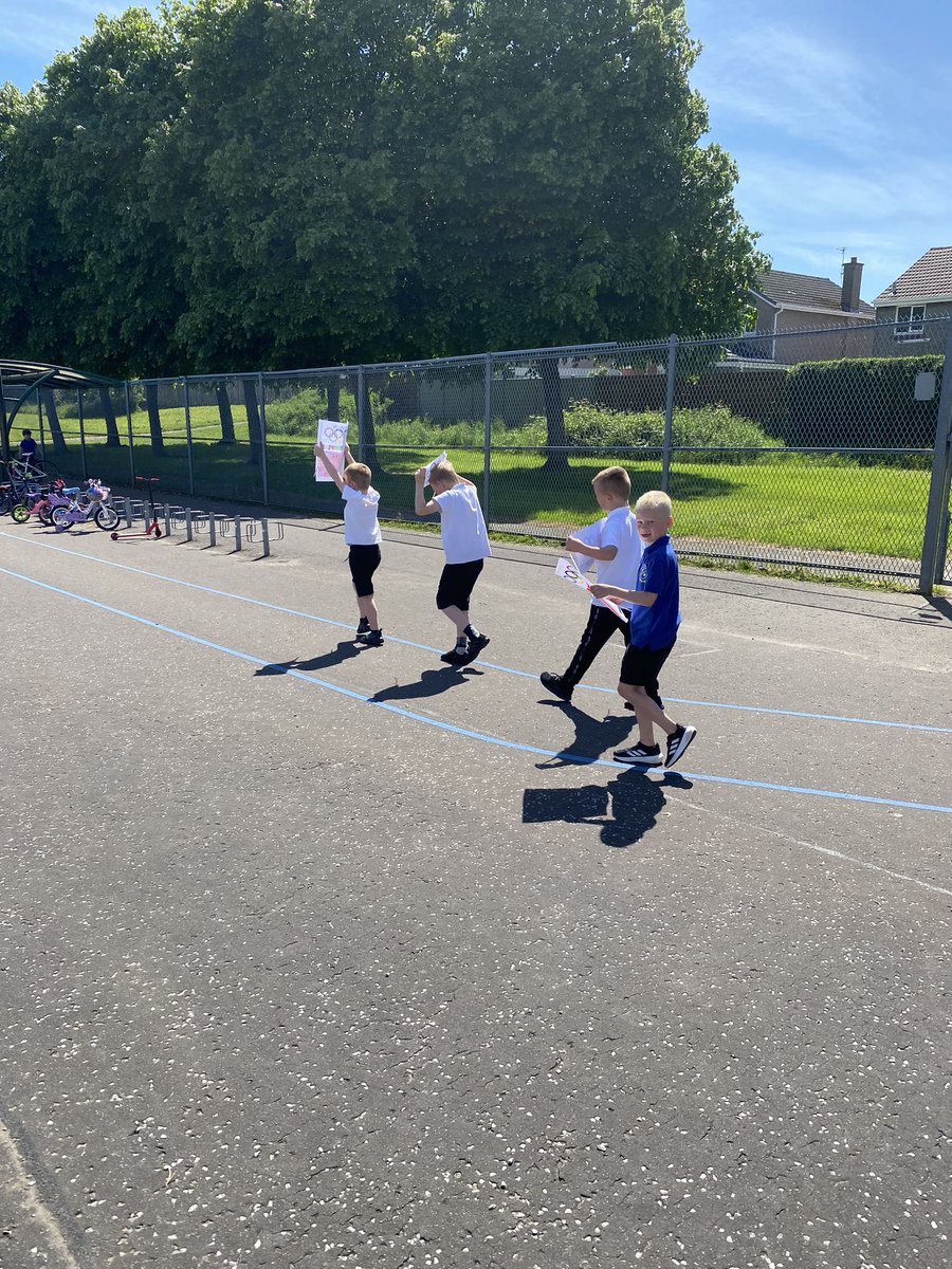 DeanburnPSP6MC's tweet photo. Enjoying the Olympic Parade in the sun! What do you think of our flags and banners? We have crammed so much into Day 1 of #DPSHealthWeek24. Who’s excited for tomorrow’s activities?! 😃 https://t.co/3K2MmXd8vM