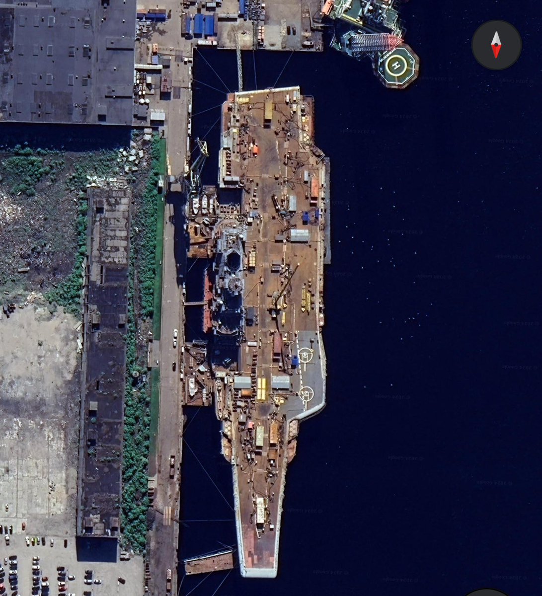 CONFIRMED: uss eisenhower (pictured docked for repairs in souda bay) hit and severely damaged by multiple houthi ballistic missiles.

judging by extensive tent city developing on the flight deck, we assess it is unlikely eisenhower will return to service in the foreseeable future