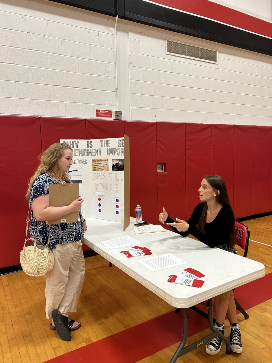 Hayli explains her research into the 2nd amendment to Ms Reber! #sealofcivicreadinessnight2024 📚🇺🇸
