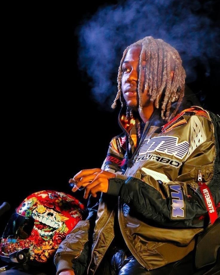 Destroy lonely in Vetements racing bomber jacket and motorsport