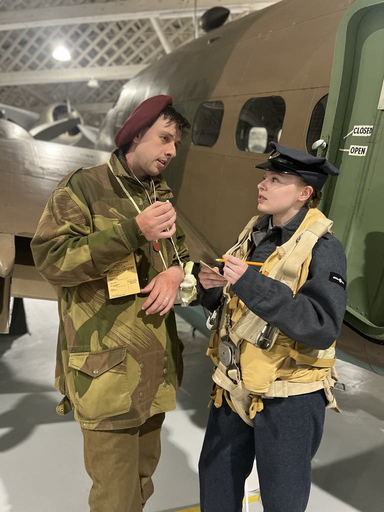 Wounded paratrooper and flying nightingale discussing details before evacuation with a broken arm D+2 1944. #dday #ddayanniversary #1944 #ww2 #paratrooper #flyingnightingales #ww2nurse #ww2paratroopers #denisonsmock #rafww2