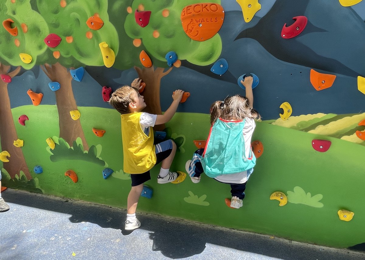 BritishValencia's tweet photo. We have a new #ClimbingWall in the #EarlyYears patio! This climbing wall will be part of our #EnrichmentProgramme for our PN to Y2 students at lunchtime. They are thrilled and thoroughly enjoying it, always supervised by their teachers and taking turns to climb #BSV #CognitaWay https://t.co/LuGA8oYmCp
