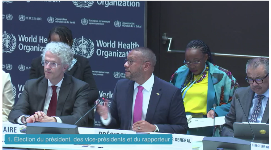 HealthPolicyW's tweet photo. New #EB155 chair - Amb Matthew Wilson #Barbados, seems set to make a mark as charismatic chair w/sense of humor. In moment of levity @ThaimissionGVA seated next to @SomaliaUNGeneva says he wants to order water to "help us cool down". @Matthewbarbados You called for water, I call for Barbadian rum.