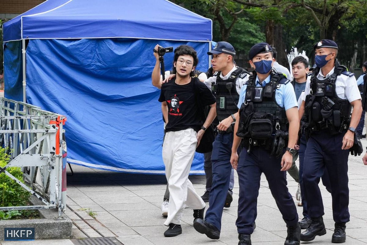 hkfp's tweet photo. Tiananmen crackdown anniversary: A young man was taken to a temporary police stand outside a patriotic carnival for questioning before being taken away in a police vehicle. 

Full coverage:  https://t.co/yFBV3b9a87 

Photos: Kyle Lam/HKFP. https://t.co/W0YCKZRxQW