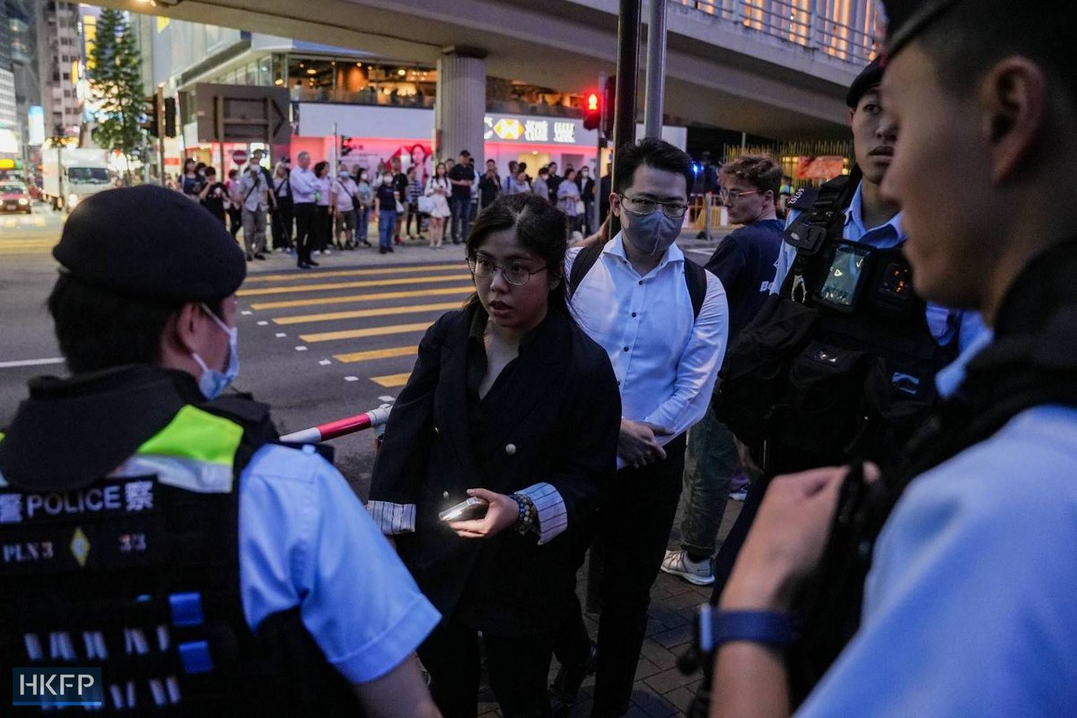 hkfp's tweet photo. Police stopped and searched a woman whose mobile phone had its torch function turned on. Officers asked her where she was going, and she told them she was in Causeway Bay to eat ramen. 

Full coverage:  https://t.co/yFBV3b9a87 

Photos: Kyle Lam/HKFP. https://t.co/HzB5Hd7whf